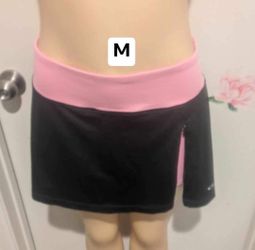 New women’s skirt with a short under size medium