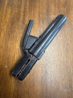 welding electrode holder, commonly  "stinger" stick welding clamp    Fe5