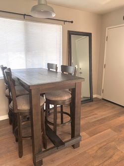 5 piece Wood Dining Set ( Tall table) comes with all stools!