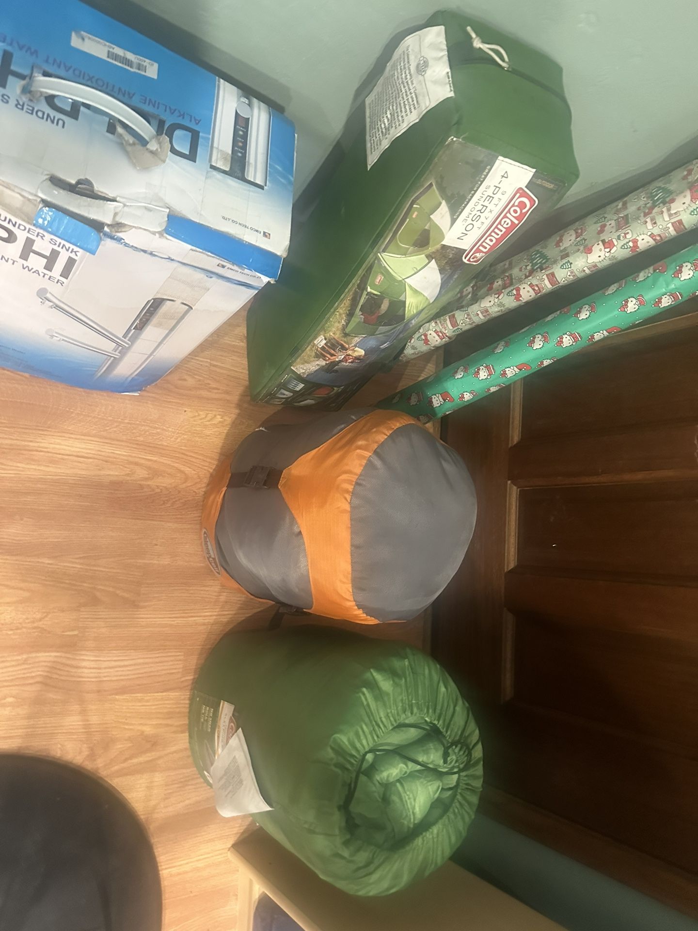 Coleman 4 person tent and 2 sleeping bags