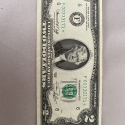 2 Dolares