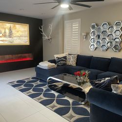 Nice Blue Sectional, Rug, And Coffee Table