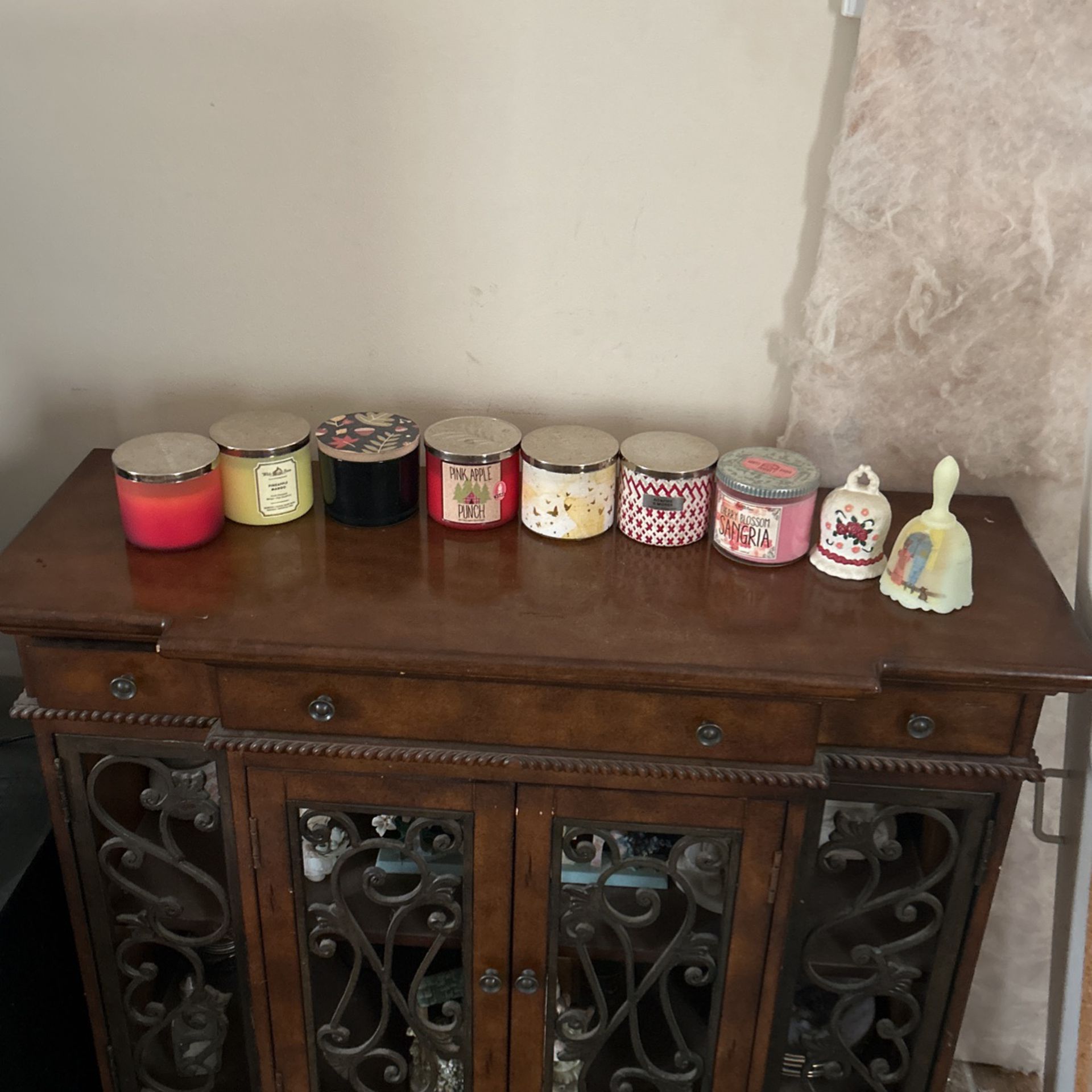 7 Candles and 2 antique bells 