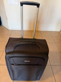 Perry Ellis Large Black Rolling Checked Suitcase (LxWxH: 25” x 16” x 10”)