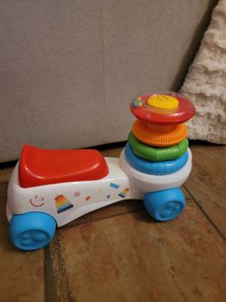 Fisher Price sit and ride toy