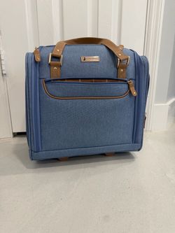 Small carry on blue suitcase
