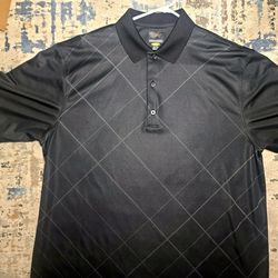 Black Greg Norman golf polo shirt featuring, geometric embossed diamond pattern. Size XL