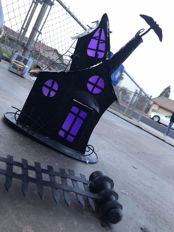 Illuminations Haunted House tea light candle holder and metal fence.