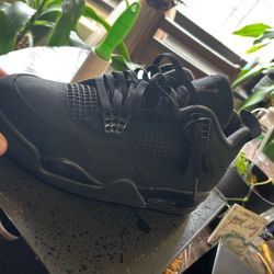 Black Cat Jordan 4s 