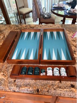 Heavy wooden backgammon set.
