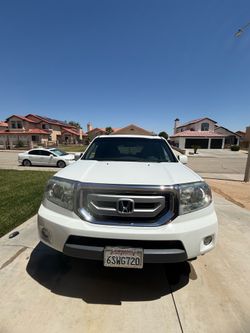 Honda pilot 2011 w/sun roof