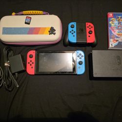 Nintendo switch V.1 with extra joy-cons and two games