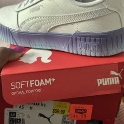 Girls Pumas Size 4,5