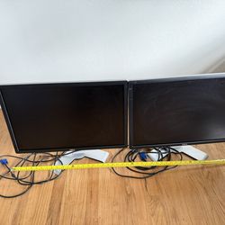 Two 24" Dell Adjustable Monitors