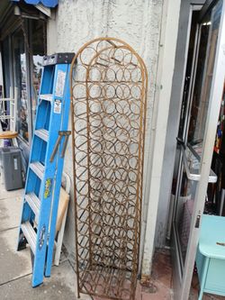 vintage mid-century modern arched metal and wrought iron wine rack,