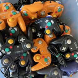 7 Bins Full Of Original OEM NINTENDO GameCube Controllers 