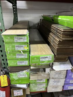 Assorted laminate and Hybrid Flooring $16 any box