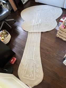 Guitar-Shaped Area Rug