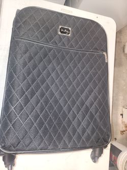 Vera bradley roll around luggage