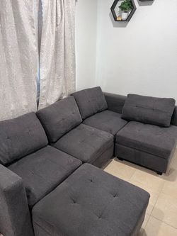 Selling grey couches