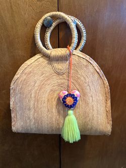 Rattan bag with charm