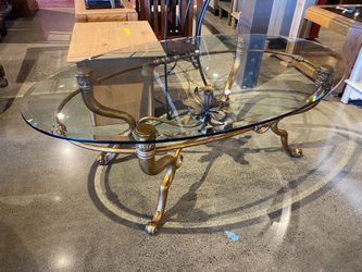 Lavish Golden Oval Glass Top Coffee Table
