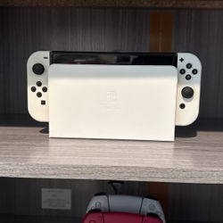 Nintendo Switch OLED Version and Accessories with 6 Games Included