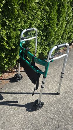 Green color collapsible walker