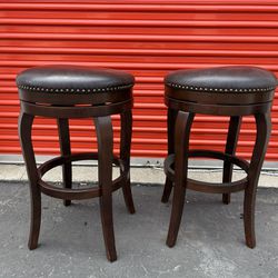 2 Bar Stools - Swivel Feature. Wood And Protective Metal On Legs (29” height)