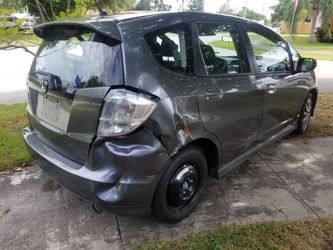 2013 Honda Fit/ rebuilt tirale $6000. as is