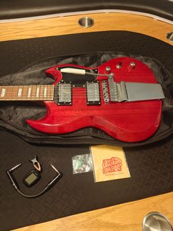 Electric guitar and Peavey amp