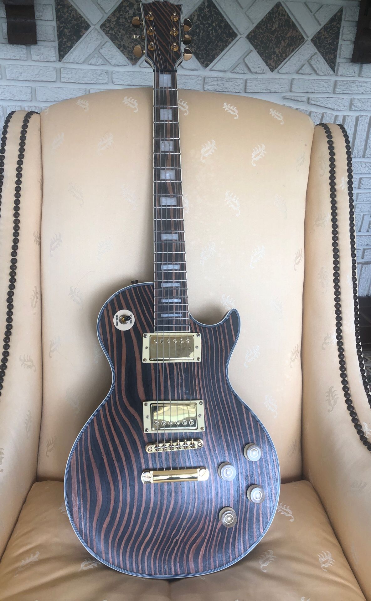 Custom les Paul style guitar. Very unique! All high quality parts. Professionally set up for great sound and easy playing!