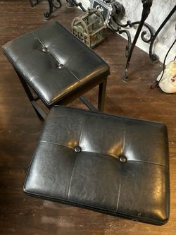 2 dark brown stools