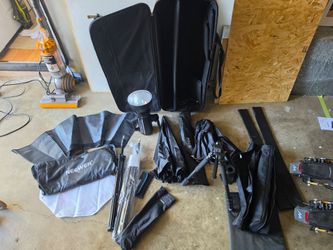 Photography setup - diffusers w/ stands, Gemini GS300II light, camera tripod, and gordox coffin case