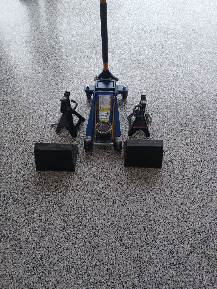 3 Ton Hydraulic Jack, Two 3 Ton Jack Stands, And Two Wheel Chucks