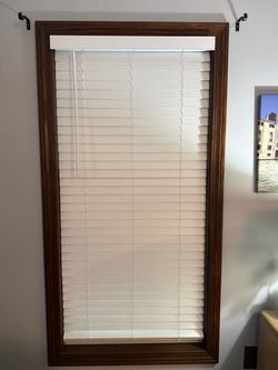 Faux wood blind