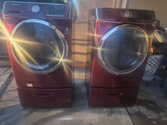 Samsung red washer and gas dryer set with pedestals