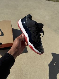Jordan 11 Low “bred”