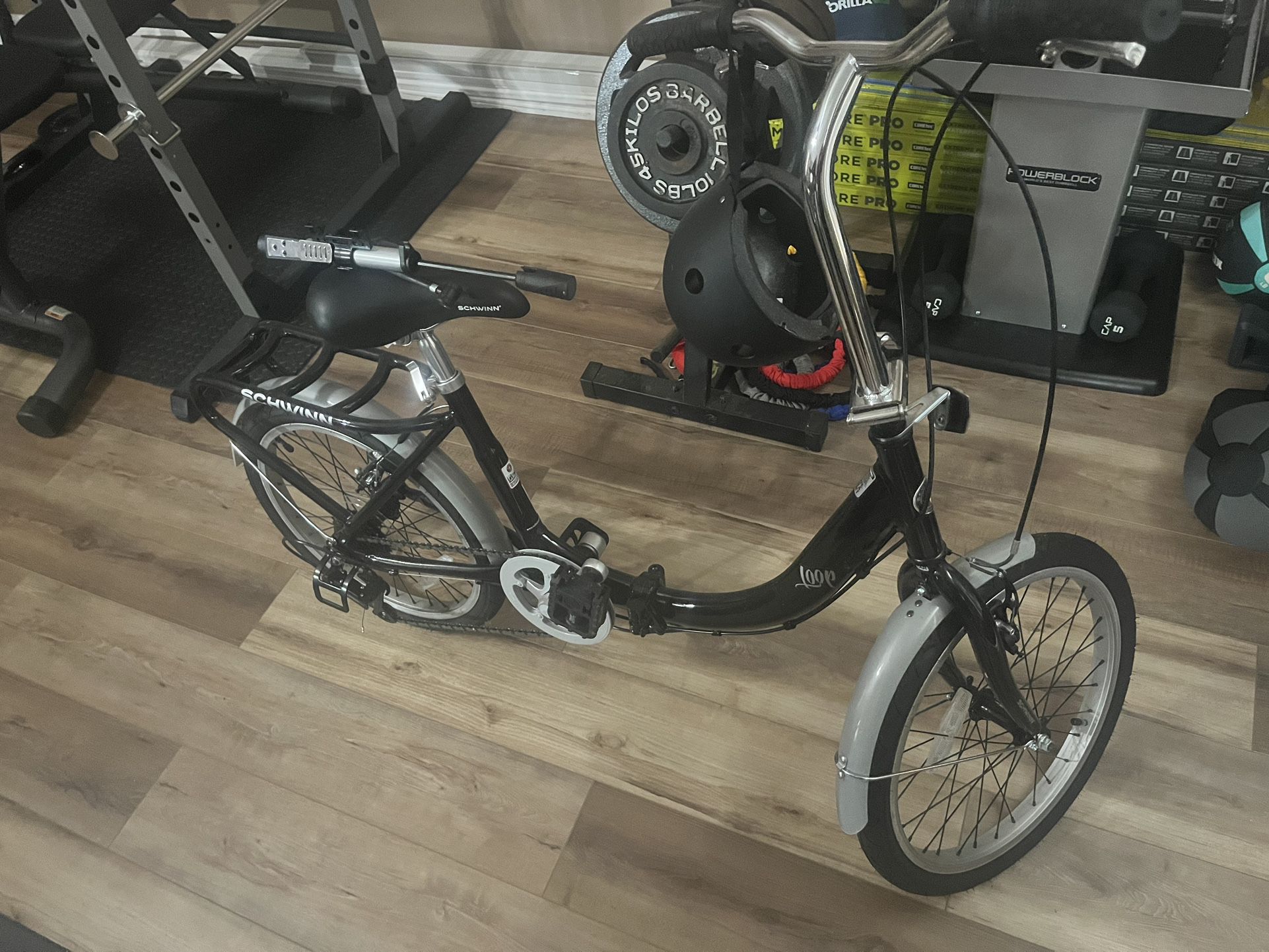 Schwinn Loop Folding Bike for Adult Men Women, 20-inch Wheels, 7-Speed Drivetrain, Rear Cargo Rack