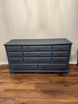 Beautiful 11-drawer French Provincial dresser with a dark blue weathered finish