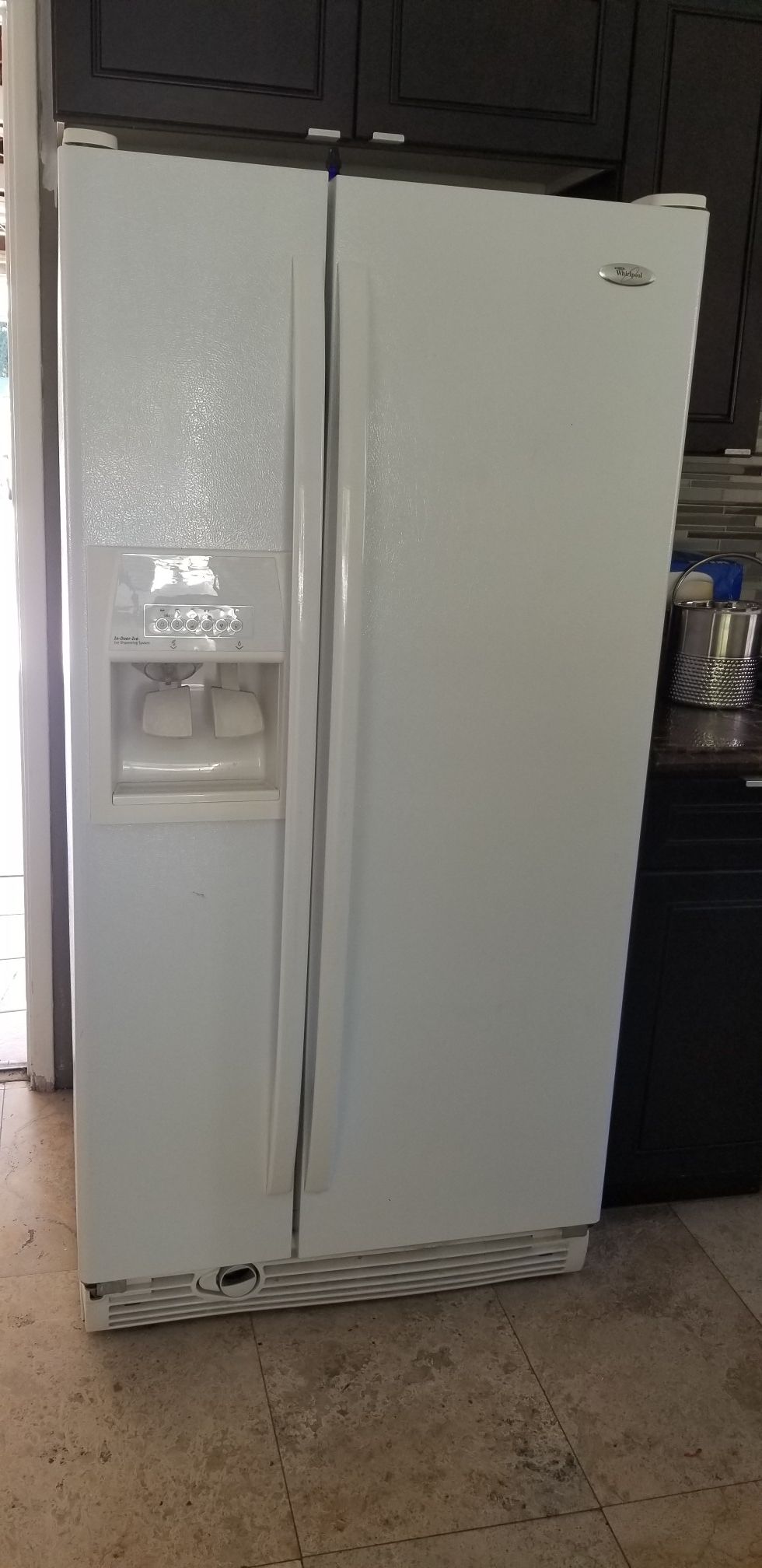 Whirlpool refrigerator said by side