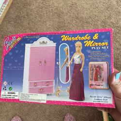 Wardrobe and mirror play sad for Barbie