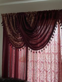 Curtains for sale 8 pieces 4 plain and 4 wooded and 4 upper pieces means 12 complete pieces 250 dollars