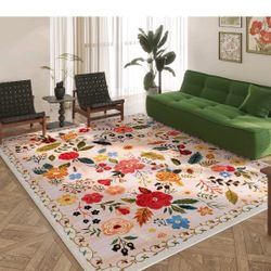Brand new, never used.
A beautiful 9x12 boho floral rug with vibrant colors that instantly warms up any space. Washable, soft underfoot, and perfect f