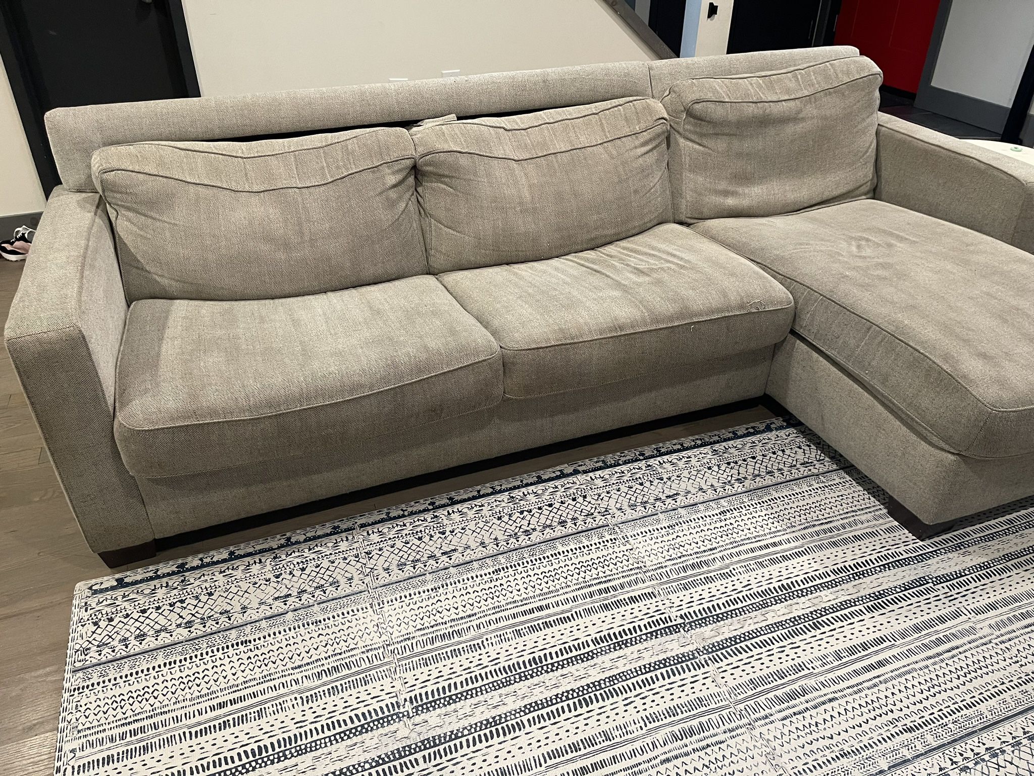 Haven Sleeper Sectional Couch With Storage-$600