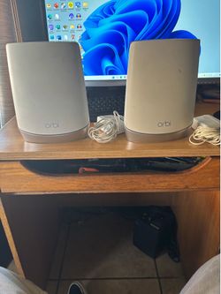 2 Netgear Orbi 750R routers only and 2 cm1000 Netgear modems for sale