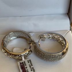 Earrings new brass with rhodium plate. diamond 1.0 ctw original price $395.99-