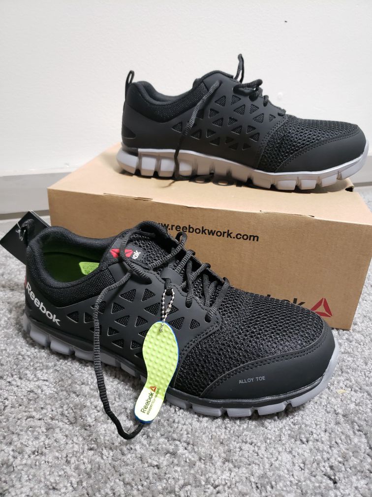 NEW REEBOK Alloy Toe Shoes - Size 10.5 W/ 8.5 M- Black / Grey