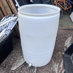 Two 55 Gallon Uline Jugs