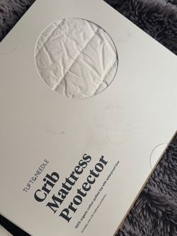 Tuft and Needle crib mattress protector